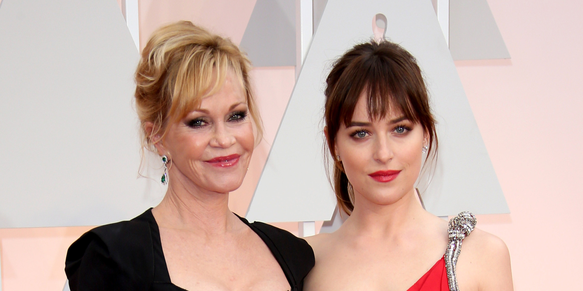 HOLLYWOOD, CA - FEBRUARY 22: (L-R) Melanie Griffith and Dakota Johnson arrive at the 87th Annual Academy Awards at Hollywood & Highland Center on February 22, 2015 in Los Angeles, California. (Photo by Dan MacMedan/WireImage)